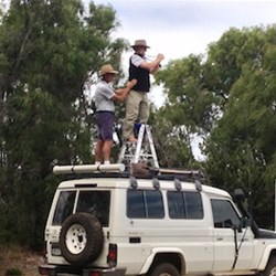 Taking a photo of the vans