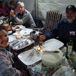 Waiting for spit roast to be carved