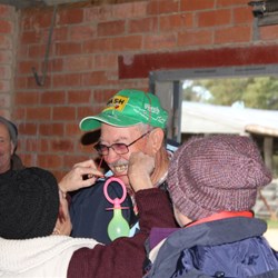 Stella anoints Phil as the New Dummy Spit Recipient