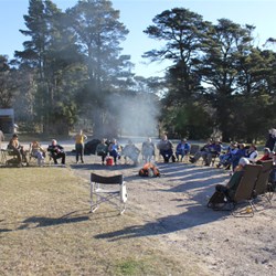 Happy Hour Around the Coal Campfire