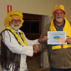 Mick Presents John With A PDB Award