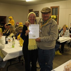 Pam Presents Rob with voucher for Set of Wheel Bearings Won at Auction