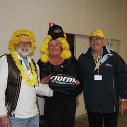 Mick and Phil Present Ann with Performax Promo Pack won at auction