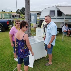 Marie and John (JC) and Dianne (Just Croozin & Treasurer) discussing the merits of alfresco laundry