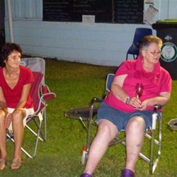 Marilyn and Pat getting engrossed in wine appreciation