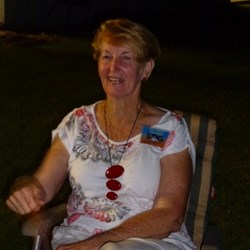 Jenny (Cannonball) relaxing by the campfire