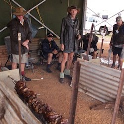 Cooking the spit roast