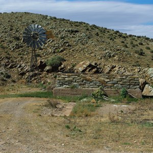 Old Stone Tank and windmill