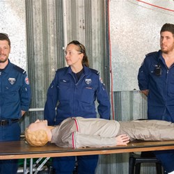 Bourke Ambos demonstrating how to use Defibrillator that BOG is donating to town
