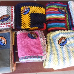 Some of the colourful rugs with the BOG logo patch