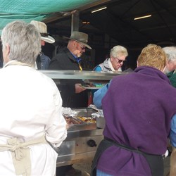 Girls hard at work serving
