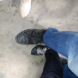 Peter's Size 20s compared to Trish's size 7; and my size 11 (the pointy one)