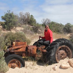 Deb in THE TRACTOR - why the beach is name TRACTOR BEACH