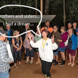 Meg trying to gather and place the reluctant stars