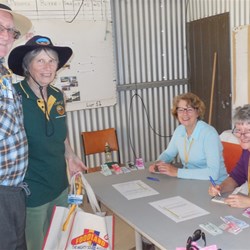 Ian and Shery purchasing tickets from the lovely Denise and Peta