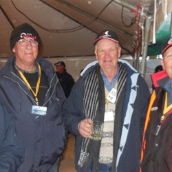 Muzza keeps a hat on to hide his hair (or lack thereof)