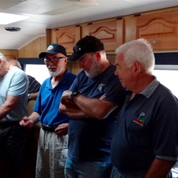 Bob explaining lithium batteries to many interested people.