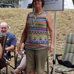 Vicki sporting her medal at awards night.