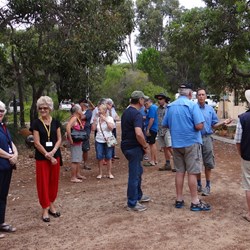 Gathering for talk on lithium batteries and ladies to look through the pottery side.