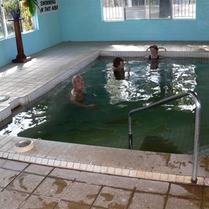 John takes a dip in one of the hot pools.