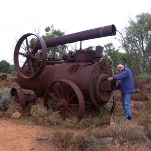 Old steam engine slowly rusting away.