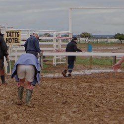 Struggling to get across the mud getting back to the vans.