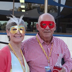 Joining in the fun of the masquerade them.