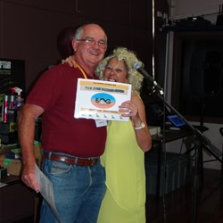 Stella with her "poor dumb bastard award".