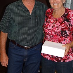 Robyn who runs The Truck Museum accepting some BOG glasses and a cheque for the museum.