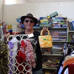 John shopping for his accessories for tonight.