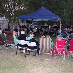 Everyone having drinks after the fashion parade.