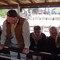 Guys all checking out the fabulous steam engine on our paddle steamer Canberra.