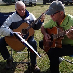 Playing music in the beautiful sunshine.