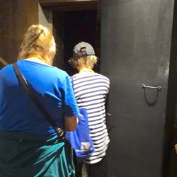 Out the secret escape door.