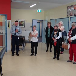 A visit to Rochester to present the rugs to REHDS.