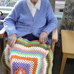 A very appreciative recipient loving her new rug.