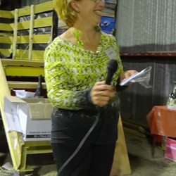 Denice McKinlay giving her donation to the BOG from the many haircuts she did during the muster.