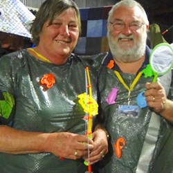 These two are having fun fishing.