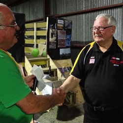 Greg presenting Bryan from the Bamawm CFA with the donation from BOG.