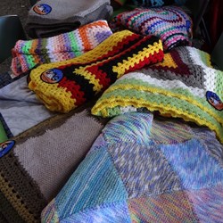 Some of the beautiful rugs the ladies made during the year.