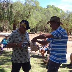 Trevor receiving a Bull #$%t bag for enlarging on one of his shots.