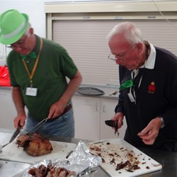 Jim, Phil & Lloyd carving the meat for our roast dinner night. 