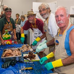 Cutting up spit roast meats