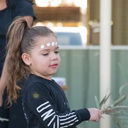 Young girl learning the dance