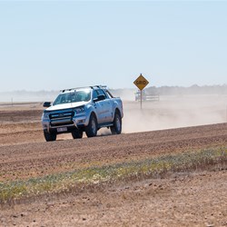 Vehicles approaching Dunlop Station