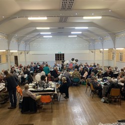 Boggers enjoying the spit roast dinner. 