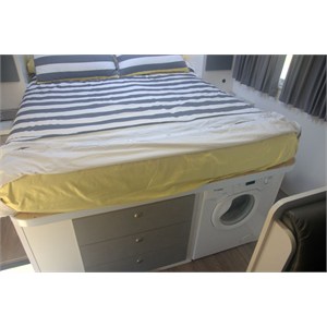the queen bed with washing machine