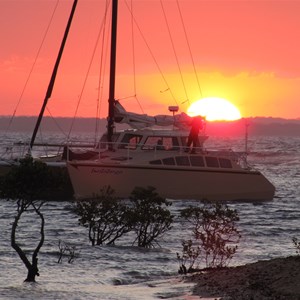 Sunset and sailboat