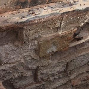 Close-up view of the limestone karst lined walls of the well