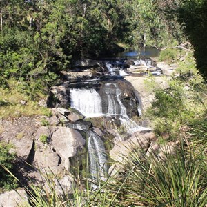 The upper falls showing the retaining wall of the weir